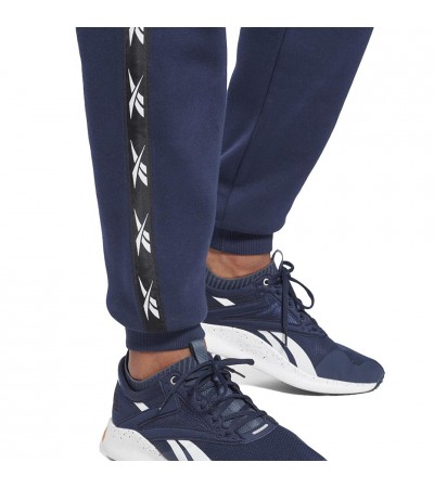 Spodnie męskie Reebok Training Essentials Tape Jogger granatowe GU9972